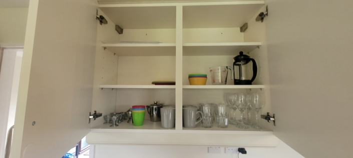 Inside a clean kitchen cupboard